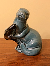 VINTAGE POOLE POTTERY OTTER HOLDING A FISH ORNAMENT