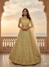 Latest Soft Butterfly Net Yellow Lehenga Choli With Dupatta For Wedding Wear