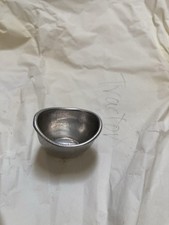 Vintage aluminum eye wash cup made by the Lavoptik Eye Wash Co.