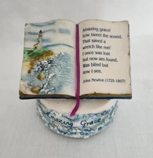 resin sculpture Amazing Grace music box; open book 3D art; 3 1/2" diam. base