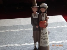 NEW BLOSSOM BUCKET PILGRIM COUPLE WITH PUMPKIN “COUNT YOUR MANY BLESSINGS"
