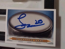 Lane Hutson Autographed Hockey Puck Signature Card Montreal Canadiens 2ndRD Pick