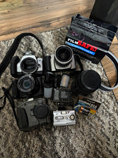 Canon EOS Rebel K2, Nikon Coolpix, Kodak DC260, DXG Quantaray 70-300 Film