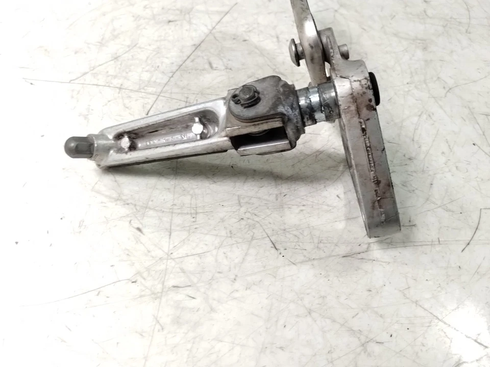 Soporte de montaje de clavija de pie delantero izquierdo Suzuki SV650 S 2001 Foto 4 de 4