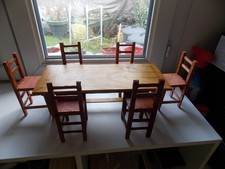 1 table + 6 chaises +1 gratuite (bois)