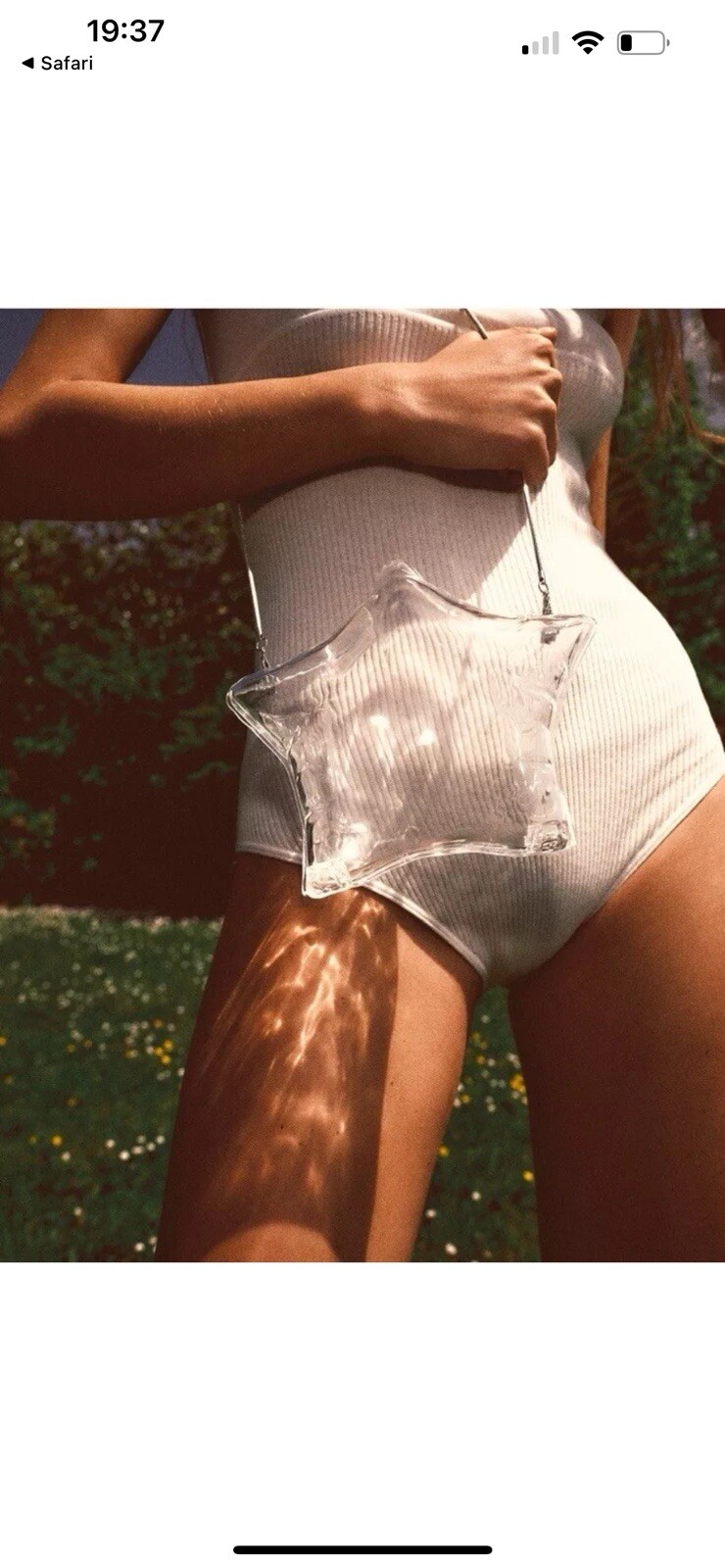 Bolso Minaudiere Zara Transparente en Forma de Estrella con Correa Bandolera de Cadena