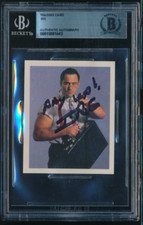 1992 WWE Merlin Sticker #33 IRS Mike Rotunda signed auto BAS BECKETT great ins*