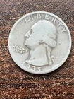 1935 S Washington silver quarter a very fine coin . And a sliver surprise