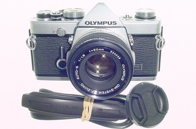 Olympus OM-1N MD analoge 35 mm manuelle Spiegelreflexkamera mit Olympus 50/1,8 Zuiko Objektiv Ex+
