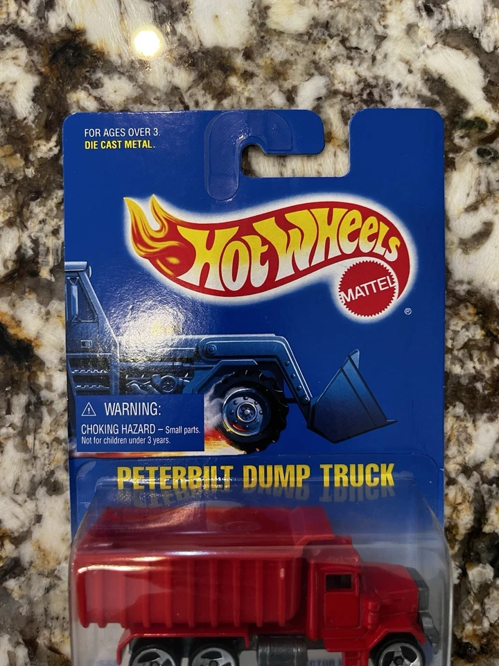 Camión de volteo Peterbilt HotWheels 1992 vintage tarjeta azul #100 ruedas básicas  Foto 2 de 4