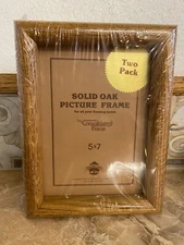 2-pack of solid oak, 5" x 7" picture frames with glass by Consolidated Frames