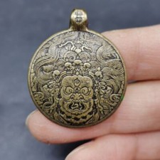The Back of The Tibetan Brass Double Sided 8 Grams and 2.8 Cm 1pc
