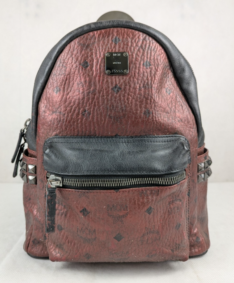 justice mini backpack Rocksax Metallica A front zip pocket color-family:White Vintage Sunflower Purse Backpack Color:Grey Heathered Poly