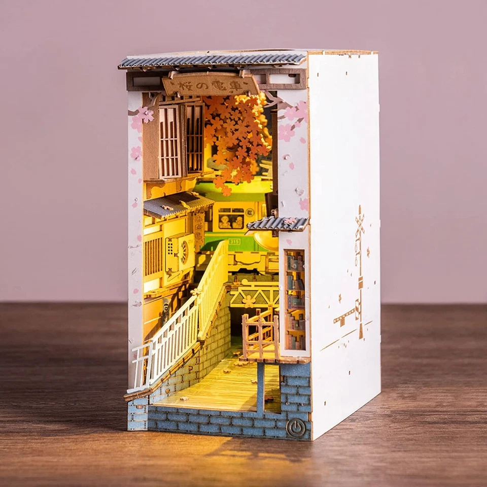 Rolife Sakura Densya 3D Holz Puzzle DIY LED Mini Haus Buch Ecke für Erwachsene - Bild 1 von 4