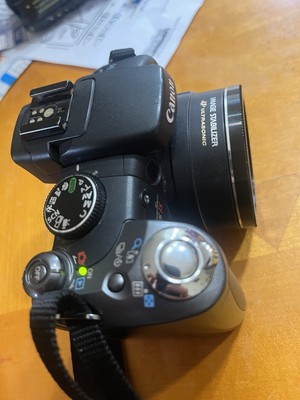 Canon PowerShot S5 IS PC1234 8.0MP 12x Optical Zoom Digital Camera