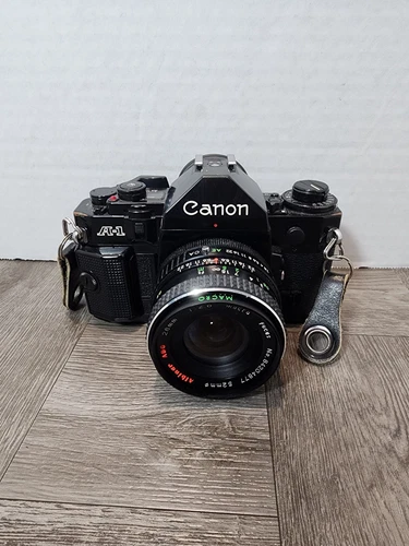 Canon A-1 A1 35mm Film Camera Black Body w/ Albinar 52mm f1:2.8 Lens Untested