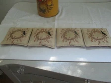 4 Primitive bowl fillers /beige with red berries and black crow.