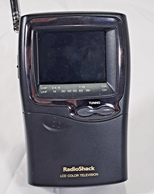 #ad Radio Shack Hand held LCD TV Vintage With Charger and Bag $20.11