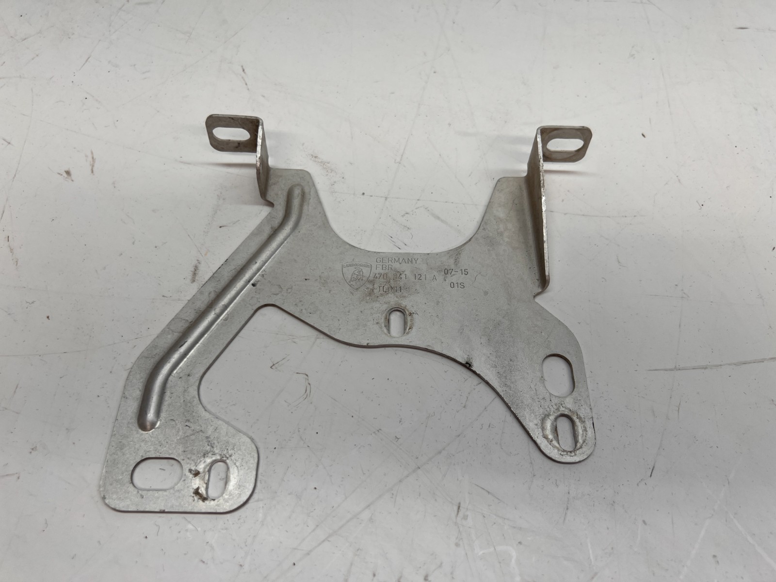 LAMBORGHINI AVENTADOR LH DRIVER SIDE HEADLIGHT SUPPORT BRACKET OEM 470941121A