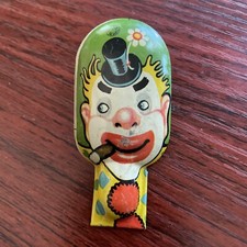 TIN NOISE MAKER TOY T. CONN Inc vintage metal clicker old circus man USA