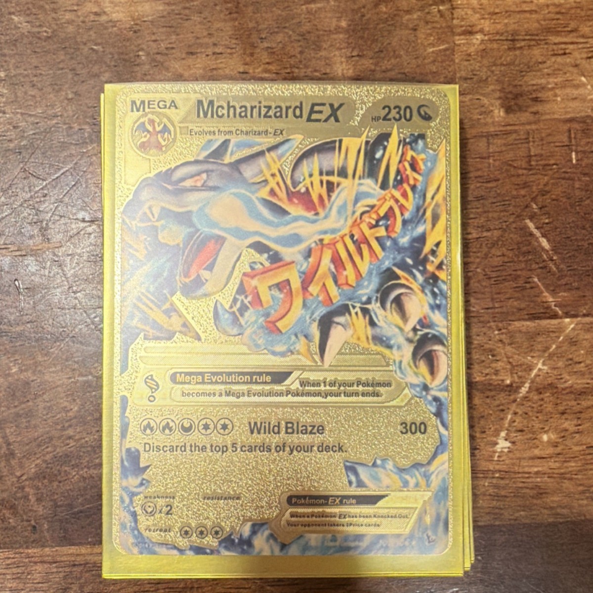 charizard pokemon card sold for 300k M Charizard EX Gold Metal Pokémon Card Mega Stage 230 HP 300 Attack