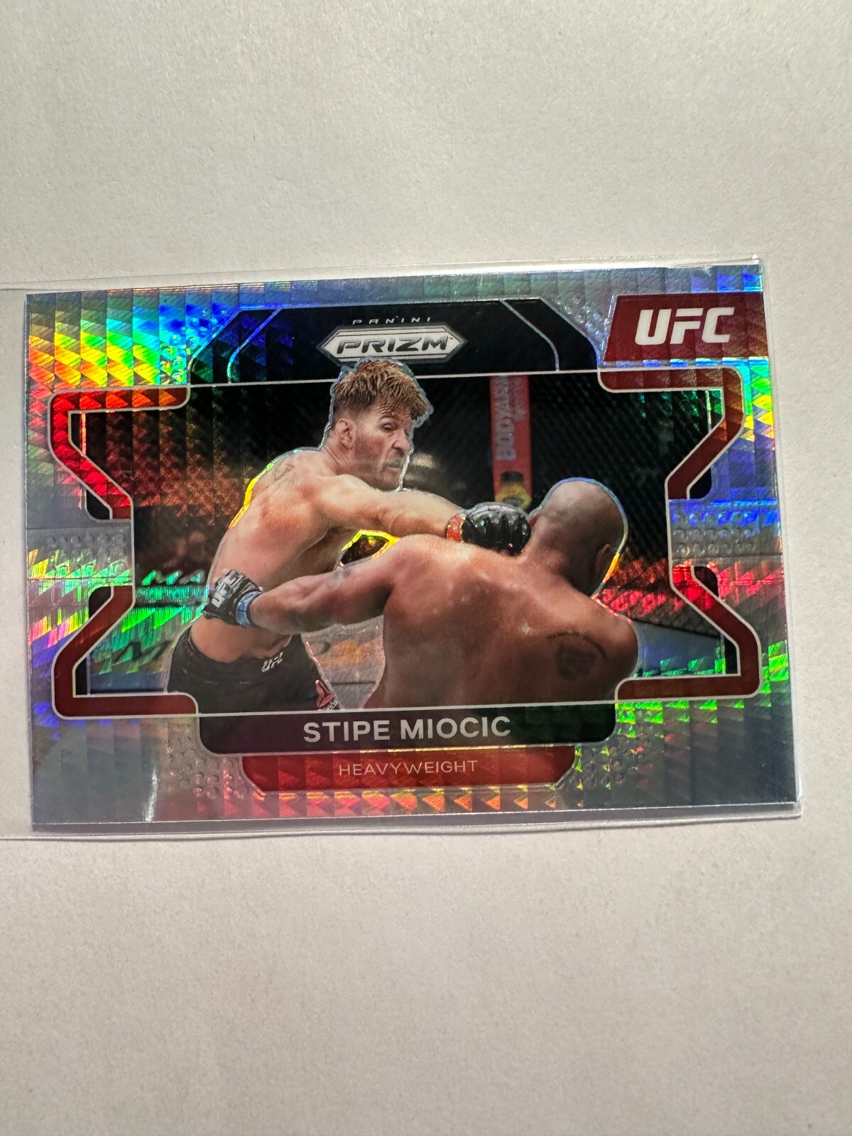 K37,078 - 2022 Panini Prizm UFC Prizms Hyper #100 Stipe Miocic
