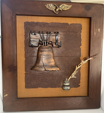 Very old-style framed wall art piece featuring a depiction of the liberty bell