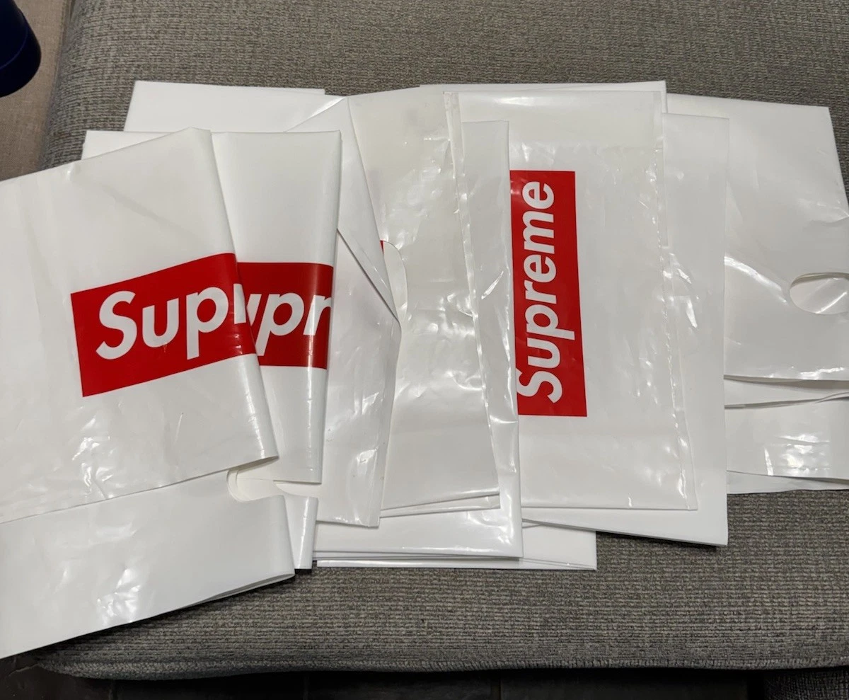 Sac shopping plastique blanc suprême logo boîte rouge tailles aléatoires