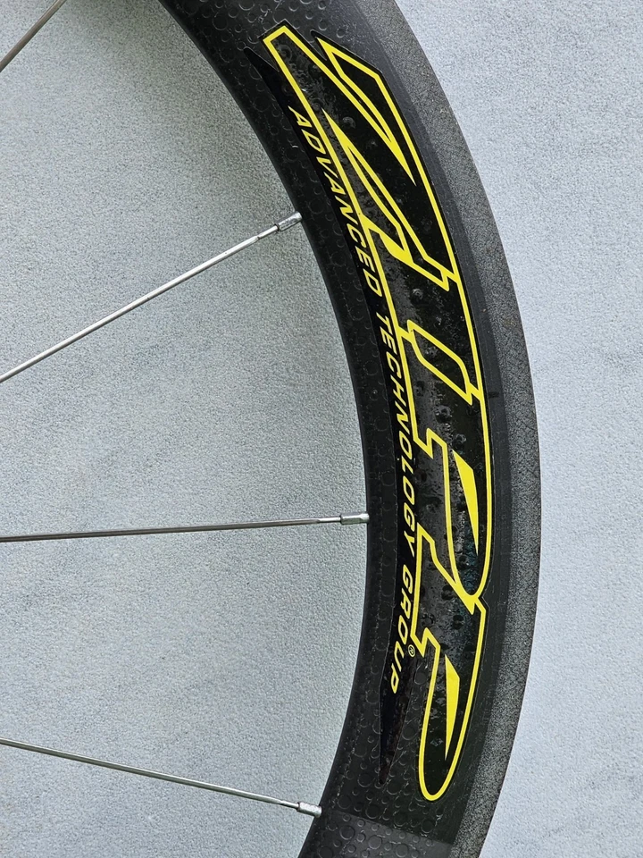 Roda dianteira tubular de carbono Zipp 404 700c – aro toroidal, cubo prata, novo na caixa - Imagem 3 de 4