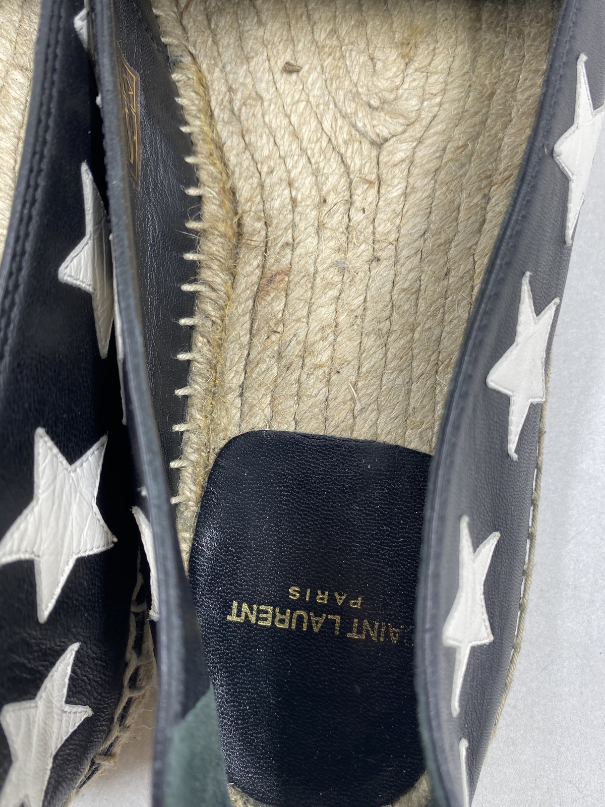 SAINT LAURENT Scarpe casual slip on Saint Lauren in pelle nera con motivo stella W 9 5