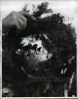 1961 Press Photo of a discarded Christmas wreath.