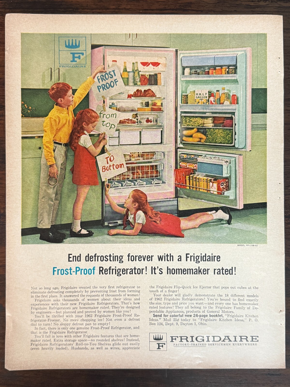 1962 Frigidaire refrigerator advertisement showing three children exploring an open fridge