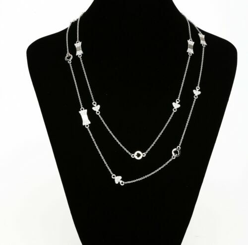 Kate Spade Silver Bows and Spade 