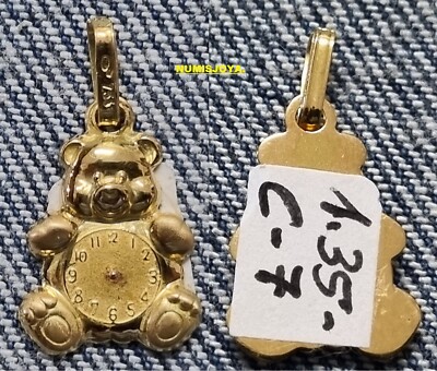 18K GOLD MEDAL BEAR WITH BIRTH TIME ENGRAVING WATCH. 1.35 gr.