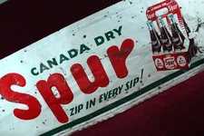 ** VINTAGE CANADA DRY DRINK SPUR SODA SIGN SURVIVOR ZIP IN EVERY SIP 1950'S **