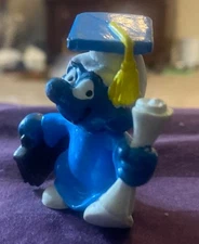 Smurfs Vintage Graduate Smurf Graduation holding diploma and briefcase