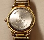 Women's Quartz Analog Dress Watch Gold Tone Case Silver Dial Arabic Bracelet — photo 2
