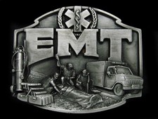 UA07125 VINTAGE 1990  EMT  COMMEMORATIVE BELT BUCKLE