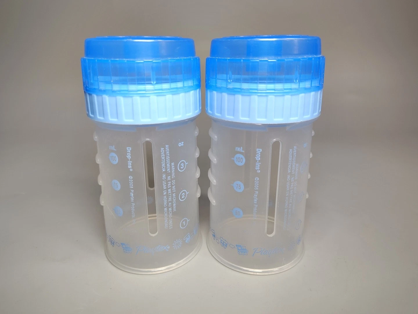 2 Vtg Playtex Drop-Ins 4 oz Baby Bottles Nurser Blue NO Nipples Train Boy + Caps
Opens in a new wind