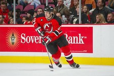 Defenseman Dan McGillis New Jersey Devils handles the puck v- Ice Hockey Photo 1