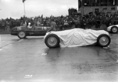 An Auto Union C under covers as Giuseppe Farina, Alfa Romeo 8C-35 1936 Old Photo