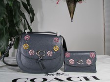 remi saddle bag with whipstitch daisy applique