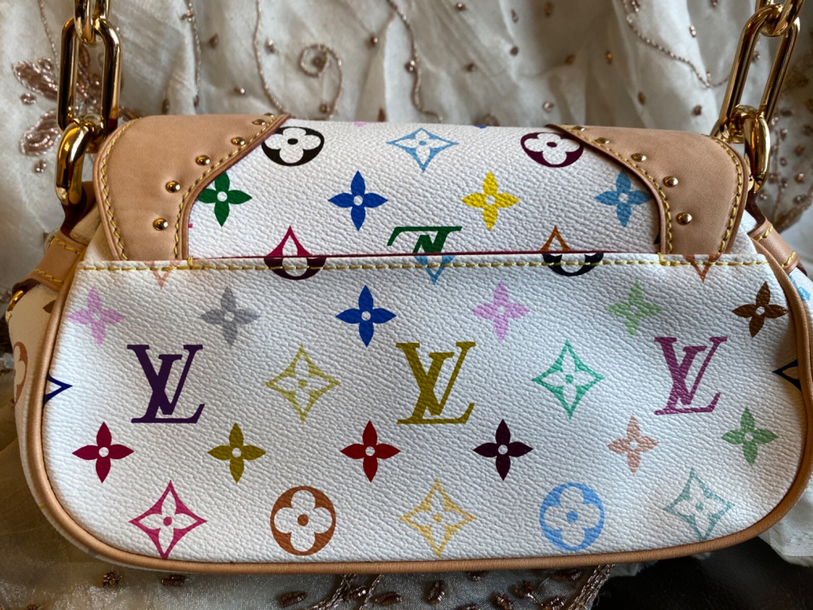 ViaAnabel - The Louis Vuitton Marilyn White Multicolor Bag is truly a  stunning piece!🌸 It features a sleek design that will hold all your girly  essentials in it!🛍 Shop her for €