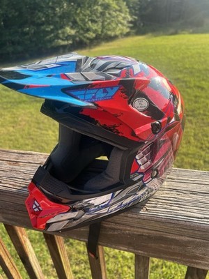 Fly Racing youth motocross helmet (Size YL, 51 52 cm) in good used condition.