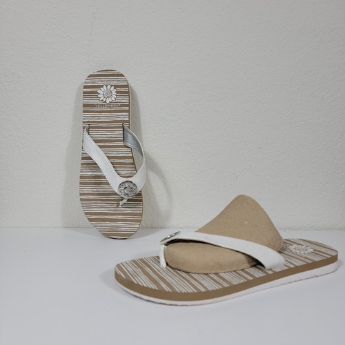 yellow box gray flip flops