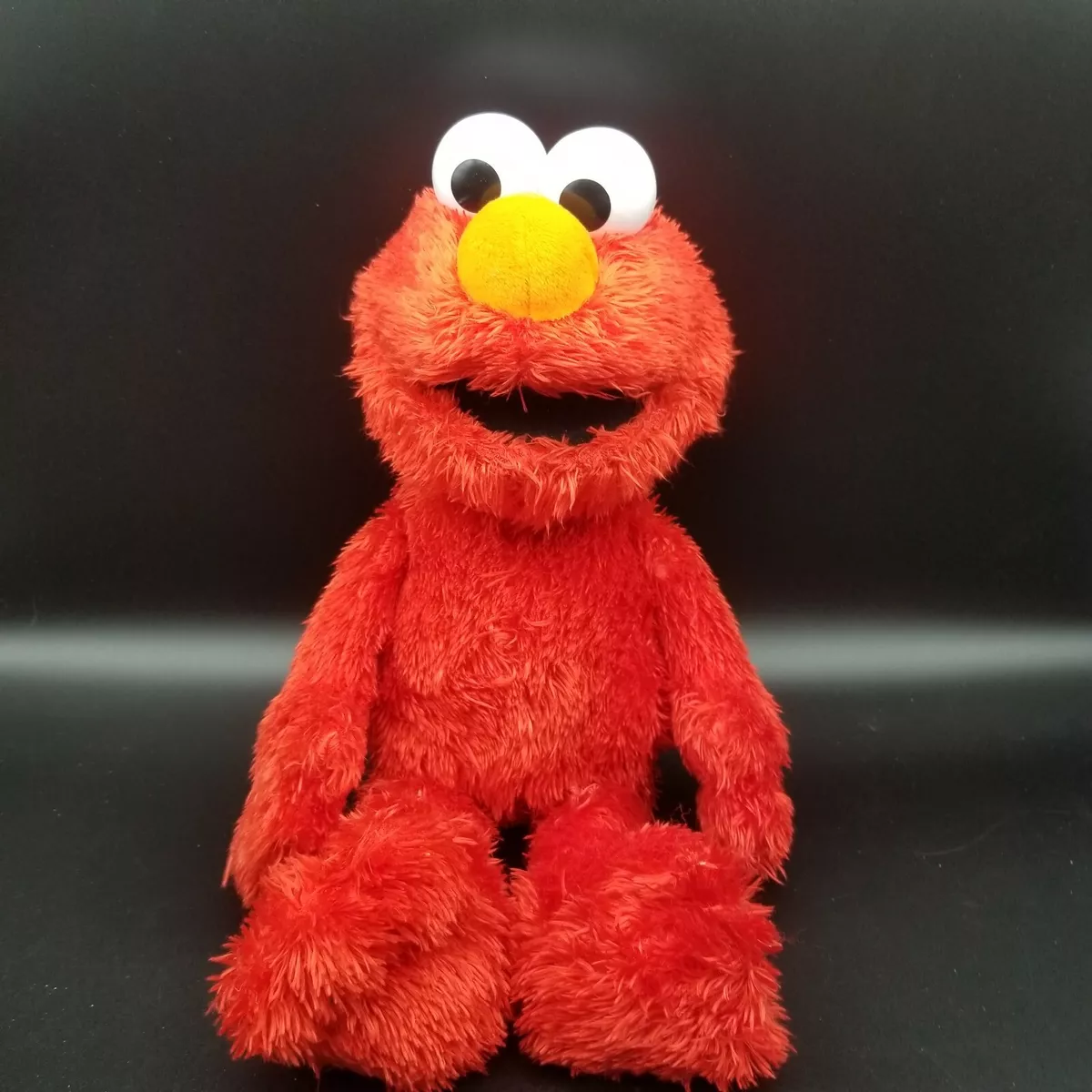 Elmo laughing best sale toy