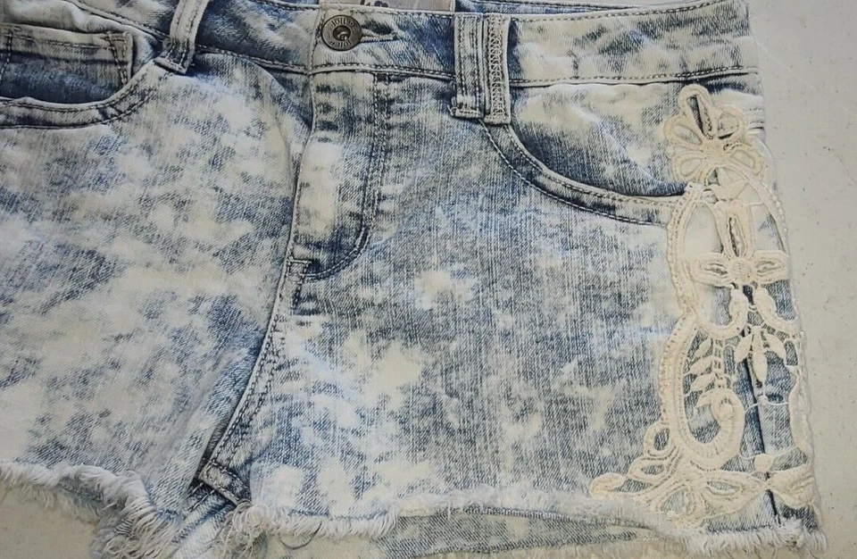 Pantalones de mezclilla azul lavado ácido talla 7 (32x2) Jolt Junior patrón de encaje en el lateral Foto 4 de 4