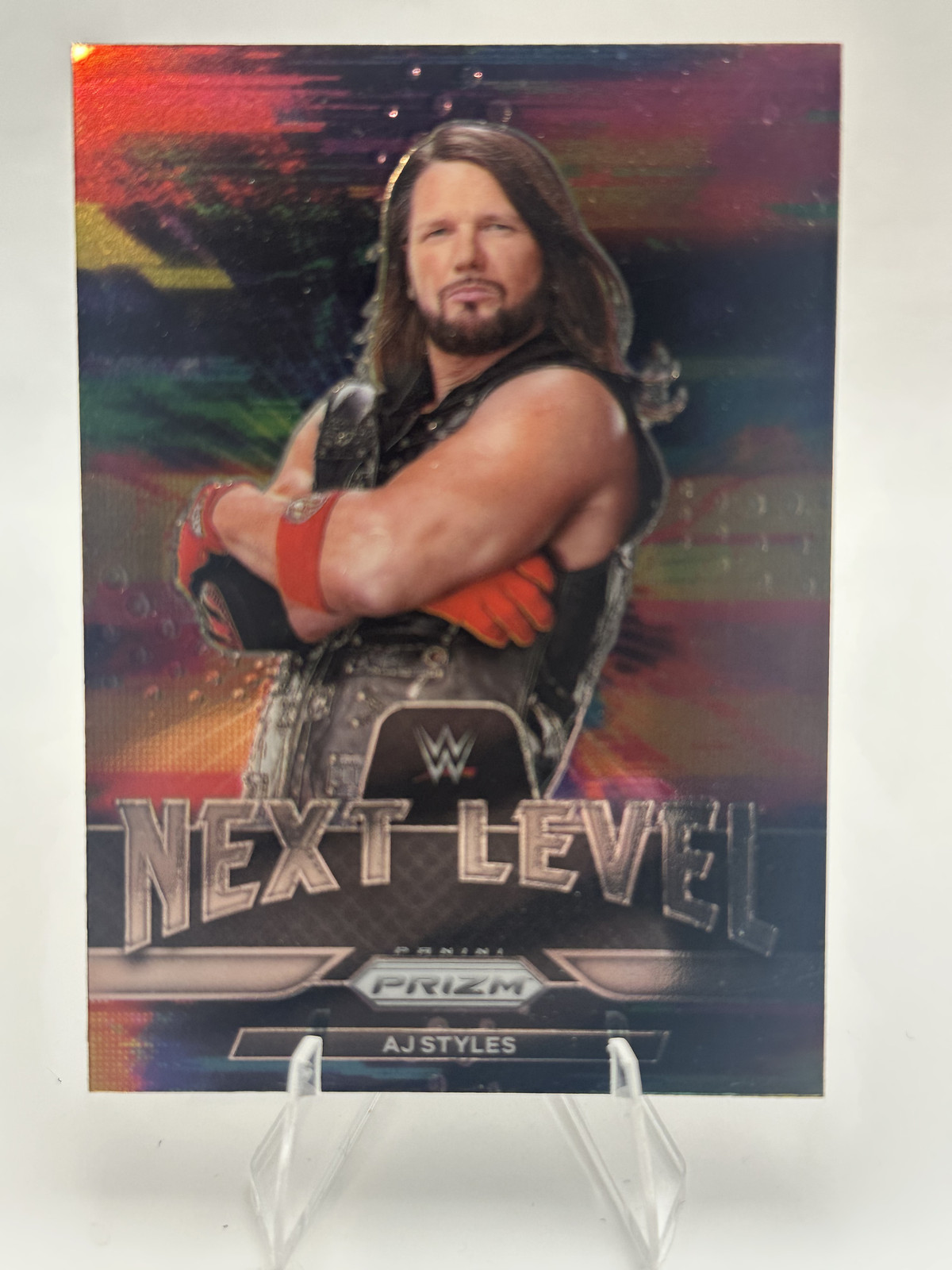 AJ Styles #13 Wrestling Cards 2022 Panini Prizm WWE Next Level trading card — raw and PSA graded price guide