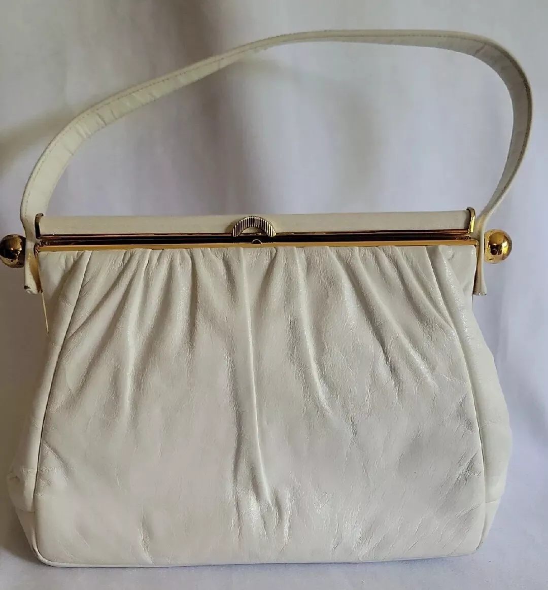 Etra purse company sale