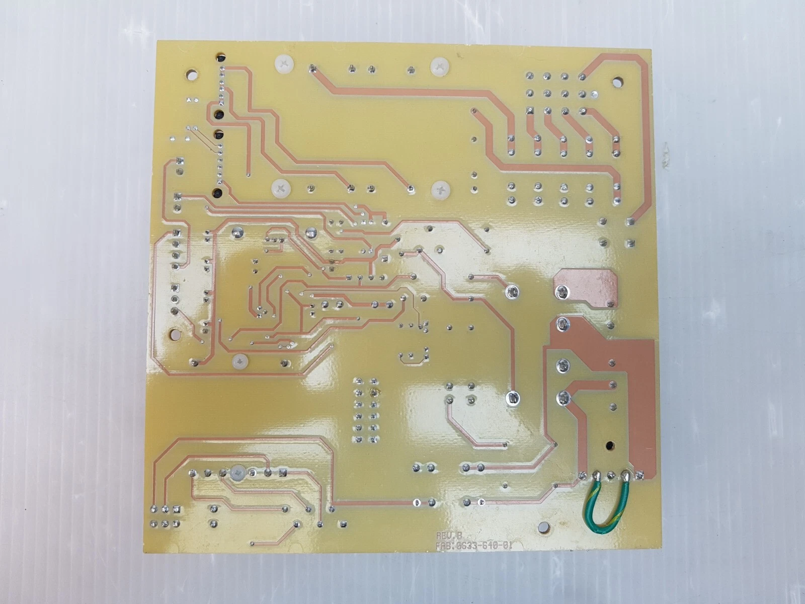 Solder side of the tan Lumenis 0633-641-01 Rev H board